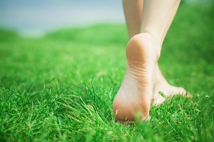 Walking barefoot on the grass